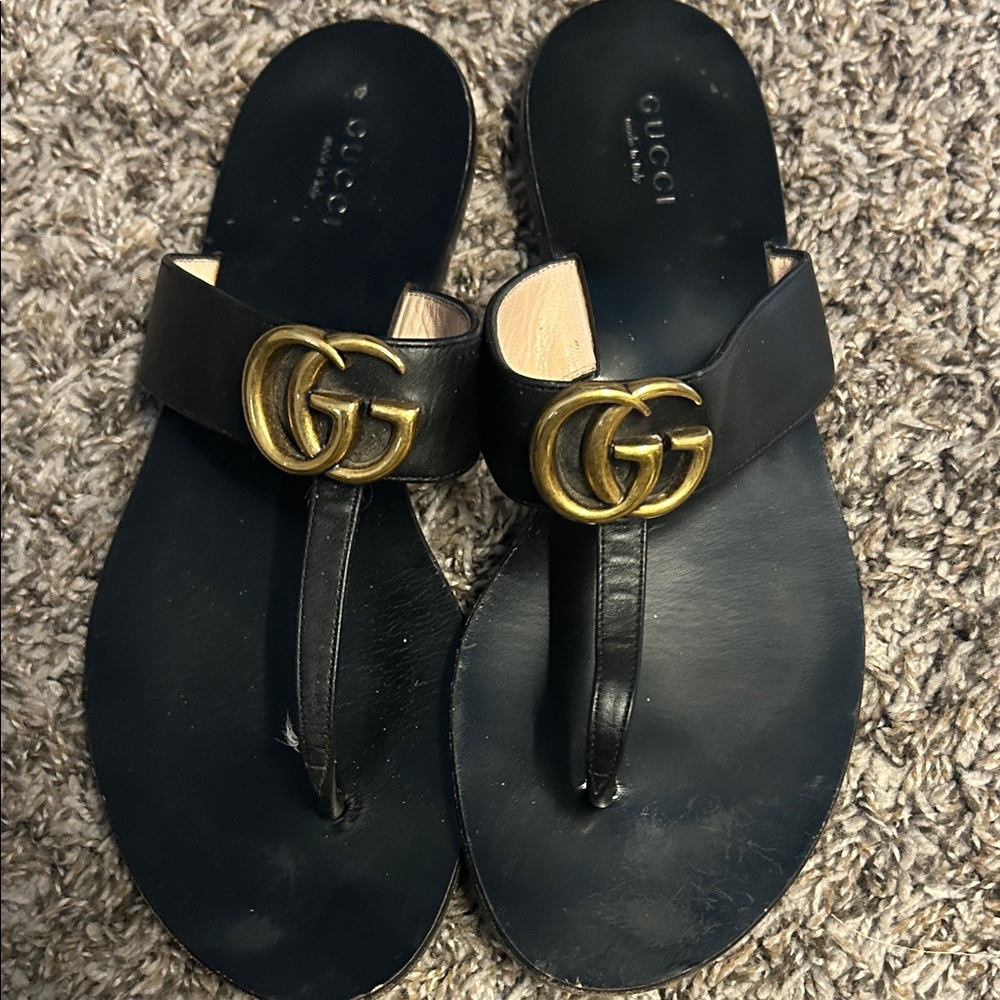 Gucci Black Leather Sandals with Gold Emblem